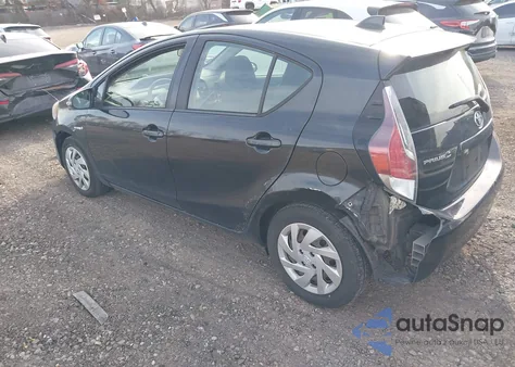 2015 Toyota Prius C One from USA, damaged, VIN JTDKDTB30F1100138